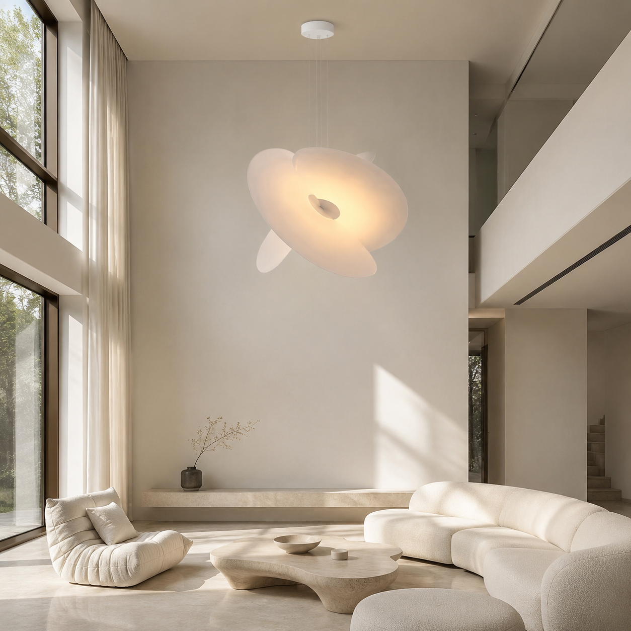 Sculptural silk fabric pendant light in a double-height living room