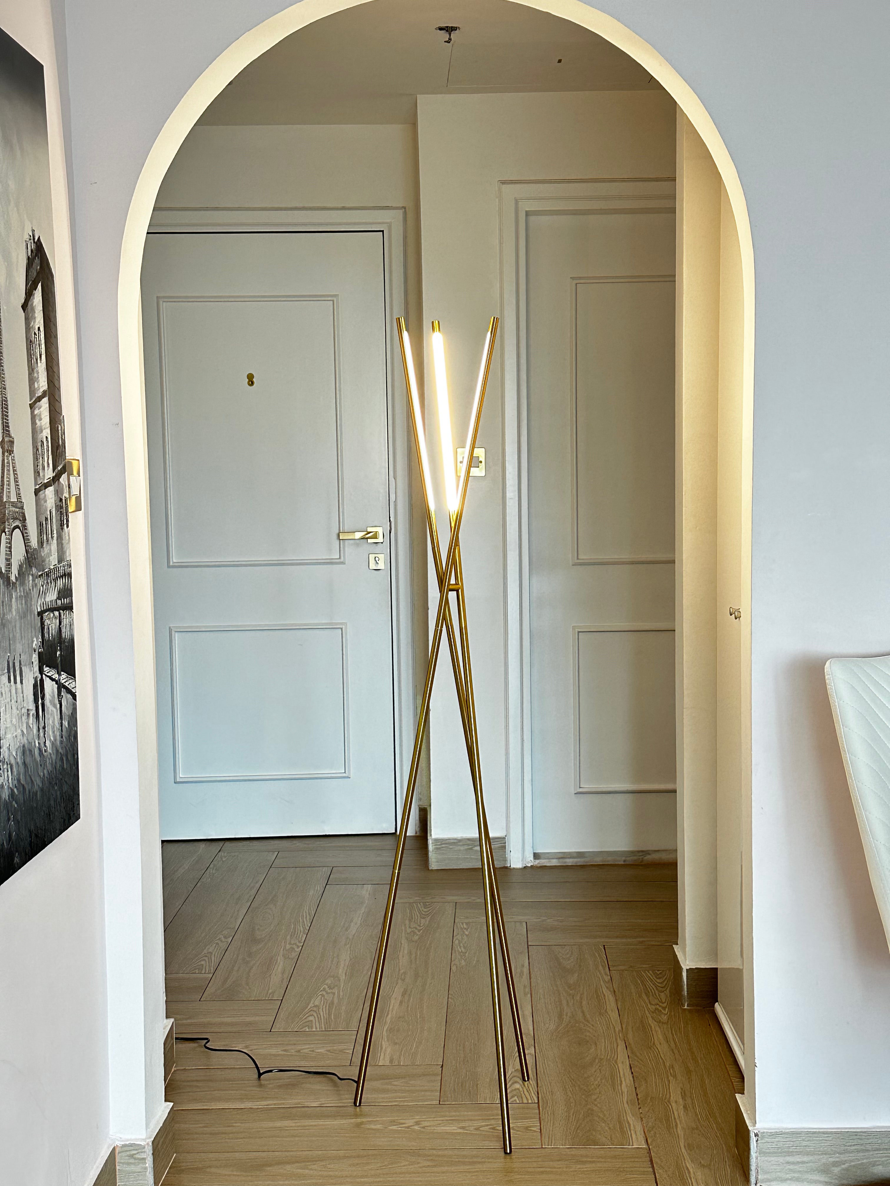 Adjustable LED Tripod Floor Lamp - Sleek Minimalist Design