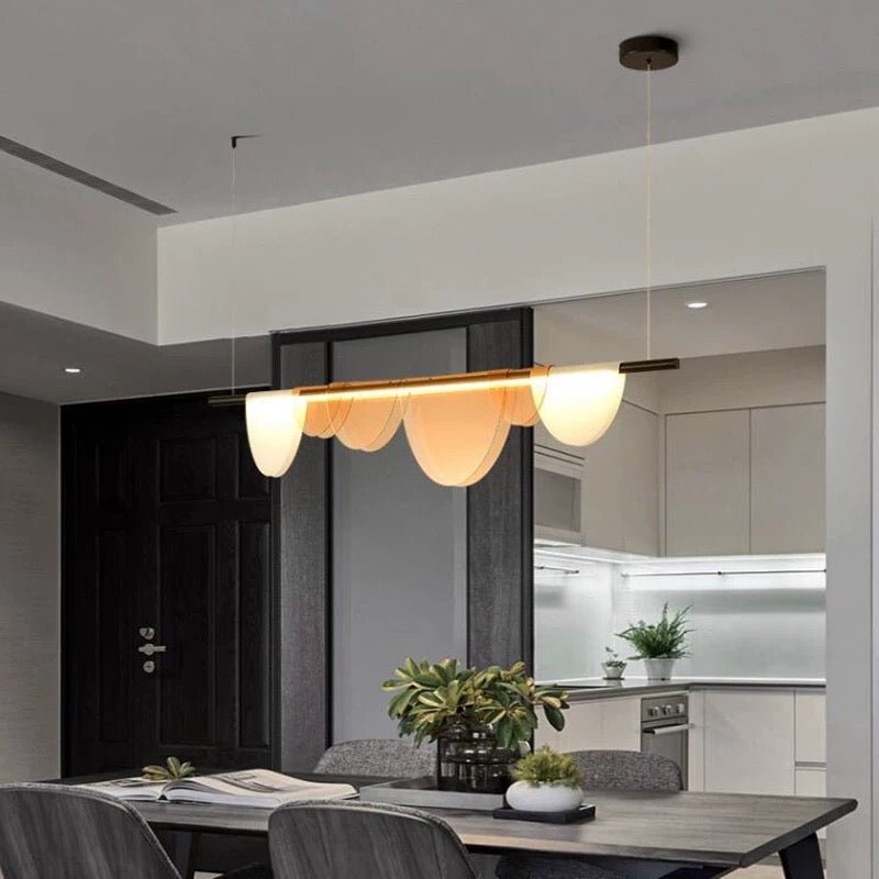 Amber Wave Linear LED Pendant Light – Modern Matte Black & Acrylic Design - SHAGHAF HOME