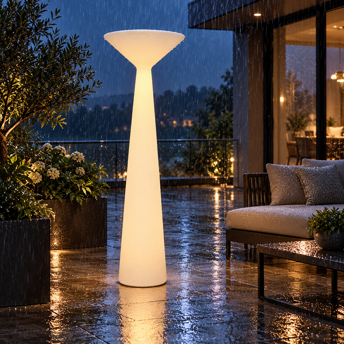 Solara IP65 rechargeable outdoor floor lamp illuminated in the rain